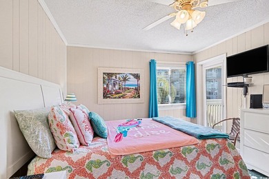 This bright two-bedroom, two-bath condominium is perched in a - photo 17
