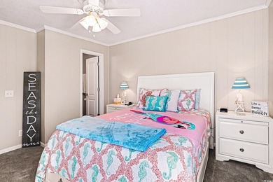 This bright two-bedroom, two-bath condominium is perched in a - photo 18
