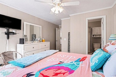 This bright two-bedroom, two-bath condominium is perched in a - photo 19