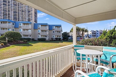 This bright two-bedroom, two-bath condominium is perched in a - photo 21