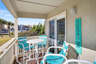 This bright two-bedroom, two-bath condominium is perched in a - photo 22