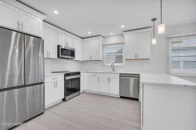 Welcome to this beautifully renovated Melville model in the - photo 22
