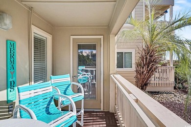 This bright two-bedroom, two-bath condominium is perched in a - photo 23
