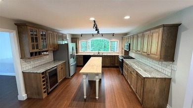 Resort Township home on a private 2.69-acre wooded parcel with - photo 19