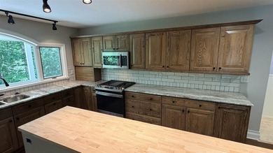 Resort Township home on a private 2.69-acre wooded parcel with - photo 21