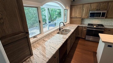 Resort Township home on a private 2.69-acre wooded parcel with - photo 22