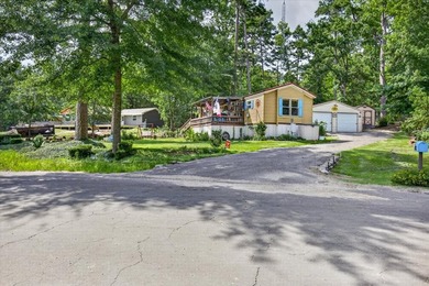 A must-see waterfront retreat! This hidden gem is truly a piece - photo 3