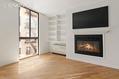 Discover a serene living experience at 8 W 65th St #4B, a - photo 2