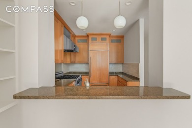 Discover a serene living experience at 8 W 65th St #4B, a - photo 5