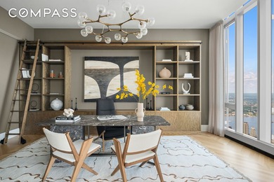 *The Apex Duplex, occupying the 127th and 128th floors, is a - photo 8
