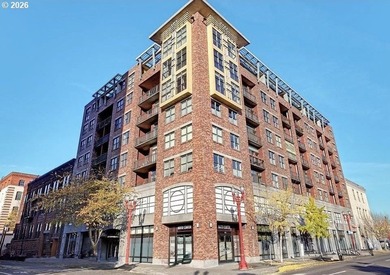 Experience elevated urban living in this refined corner unit