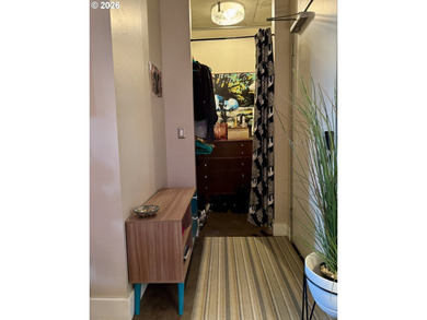 Experience elevated urban living in this refined corner unit