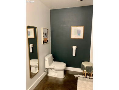 Experience elevated urban living in this refined corner unit