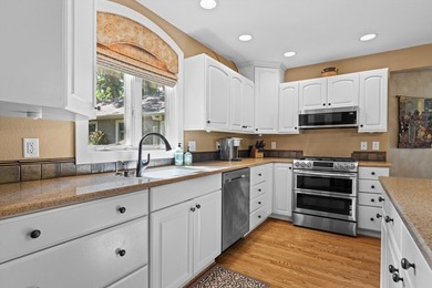 Lake living starts here! Nestled in the heart of Delafield, this - photo 12