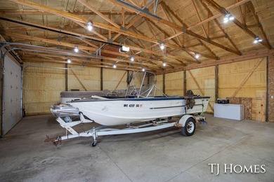 Lakefront Retreat on Gun Lake! Enjoy waterfront living with this - photo 33