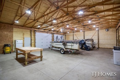 Lakefront Retreat on Gun Lake! Enjoy waterfront living with this - photo 35