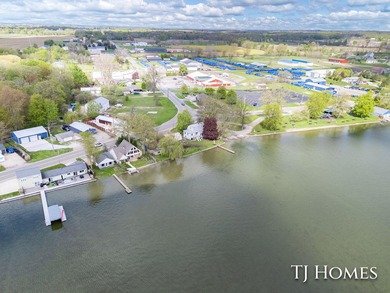 Lakefront Retreat on Gun Lake! Enjoy waterfront living with this - photo 40