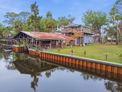 Discover the ultimate Suwannee, FL waterfront retreat with this - photo 1
