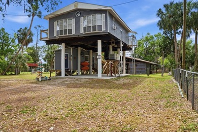 Discover the ultimate Suwannee, FL waterfront retreat with this - photo 3