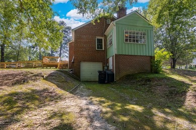 Charming 2-bedroom, 1-bath brick home situated on a corner lot - photo 26