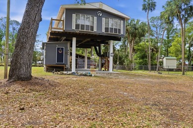 Discover the ultimate Suwannee, FL waterfront retreat with this - photo 7