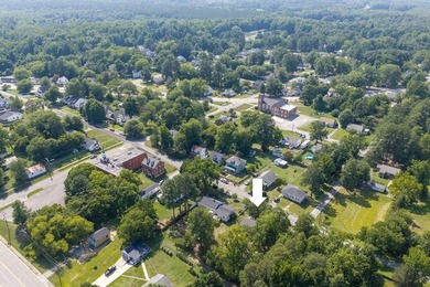 Charming 2-bedroom, 1-bath brick home situated on a corner lot - photo 30