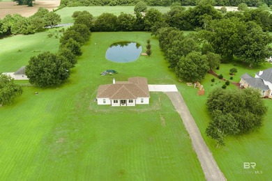 Nestled on nearly three acres of pristine land in Fairhope, this - photo 3