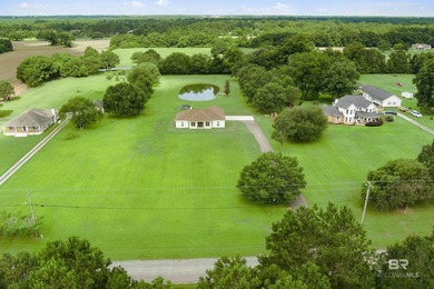 Nestled on nearly three acres of pristine land in Fairhope, this - photo 4