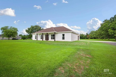 Nestled on nearly three acres of pristine land in Fairhope, this - photo 7