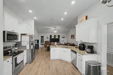 This brick home welcomes you with a thoughtful split floor plan - photo 5