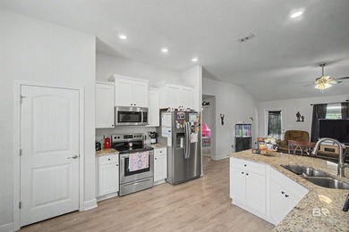 This brick home welcomes you with a thoughtful split floor plan - photo 6