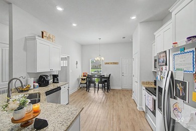 This brick home welcomes you with a thoughtful split floor plan - photo 7