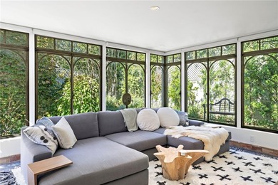 Experience timeless elegance and coastal charm in this - photo 12