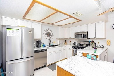 Beautifully updated Condo! From the flooring to the counter tops - photo 17