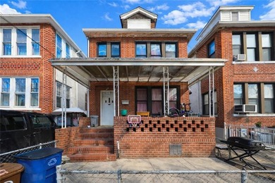 Introducing this rare, large full-brick two-family home located - photo 1