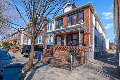Introducing this rare, large full-brick two-family home located - photo 3