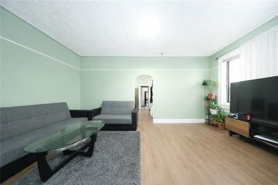 Introducing this rare, large full-brick two-family home located - photo 6