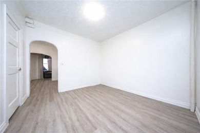 Introducing this rare, large full-brick two-family home located - photo 9