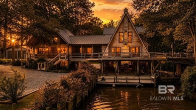 (private lake, pond, coastal) Home For Sale in Summerdale Alabama