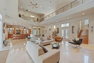Experience refined coastal luxury in this exceptional 4-bedroom - photo 1
