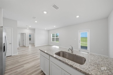 Like-new construction for LESS in Foley's highly sought-after - photo 6