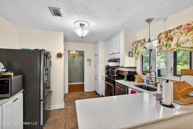 Welcome to this charming 1950's gem nestled in the heart of - photo 12