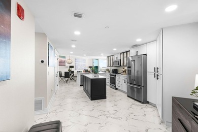 Welcome to an exceptional waterfront retreat in the highly - photo 6