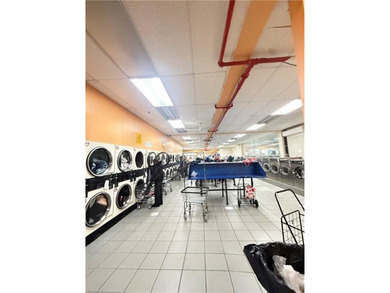 Great investment property with big and busy laundromat - photo 7