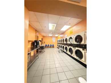 Great investment property with big and busy laundromat - photo 9