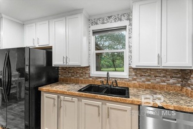 Welcome home to this well-maintained 3-bedroom, 2-bath mobile - photo 8