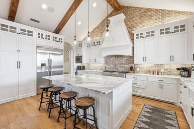 Incredible lakefront retreat with front row panoramic views of - photo 12