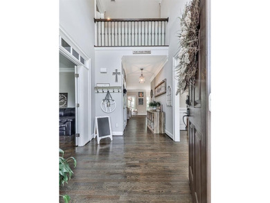 Welcome to this stately 5-bedroom, 4-bath home situated on a - photo 4