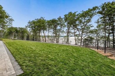 Perched high above the shimmering waters of Lake Winnisquam in - photo 8