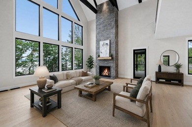 Perched high above the shimmering waters of Lake Winnisquam in - photo 10